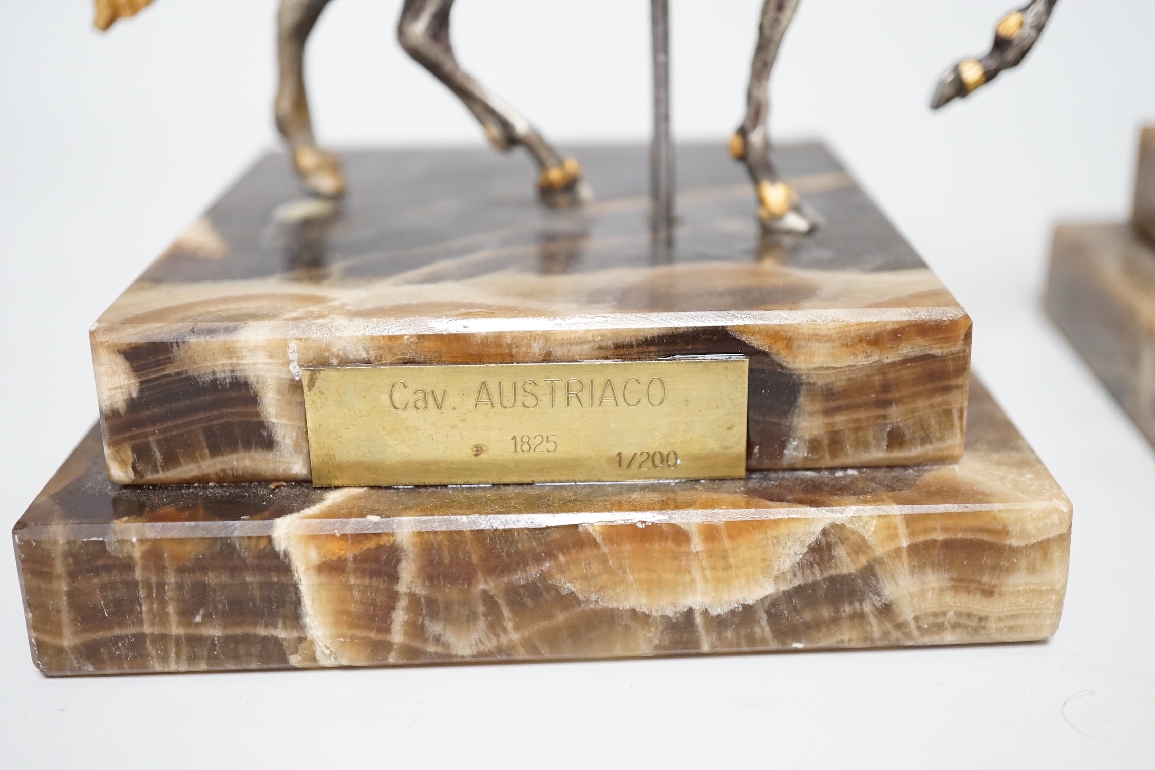Two limited edition gilt bronze of horseback riders on marble bases, plaques read ‘Cav. AUSTRIACO 1825 1/200’ and ‘26/200’ 17cm